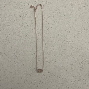 Kendra Scott - Rose gold with rose gold stone necklace.